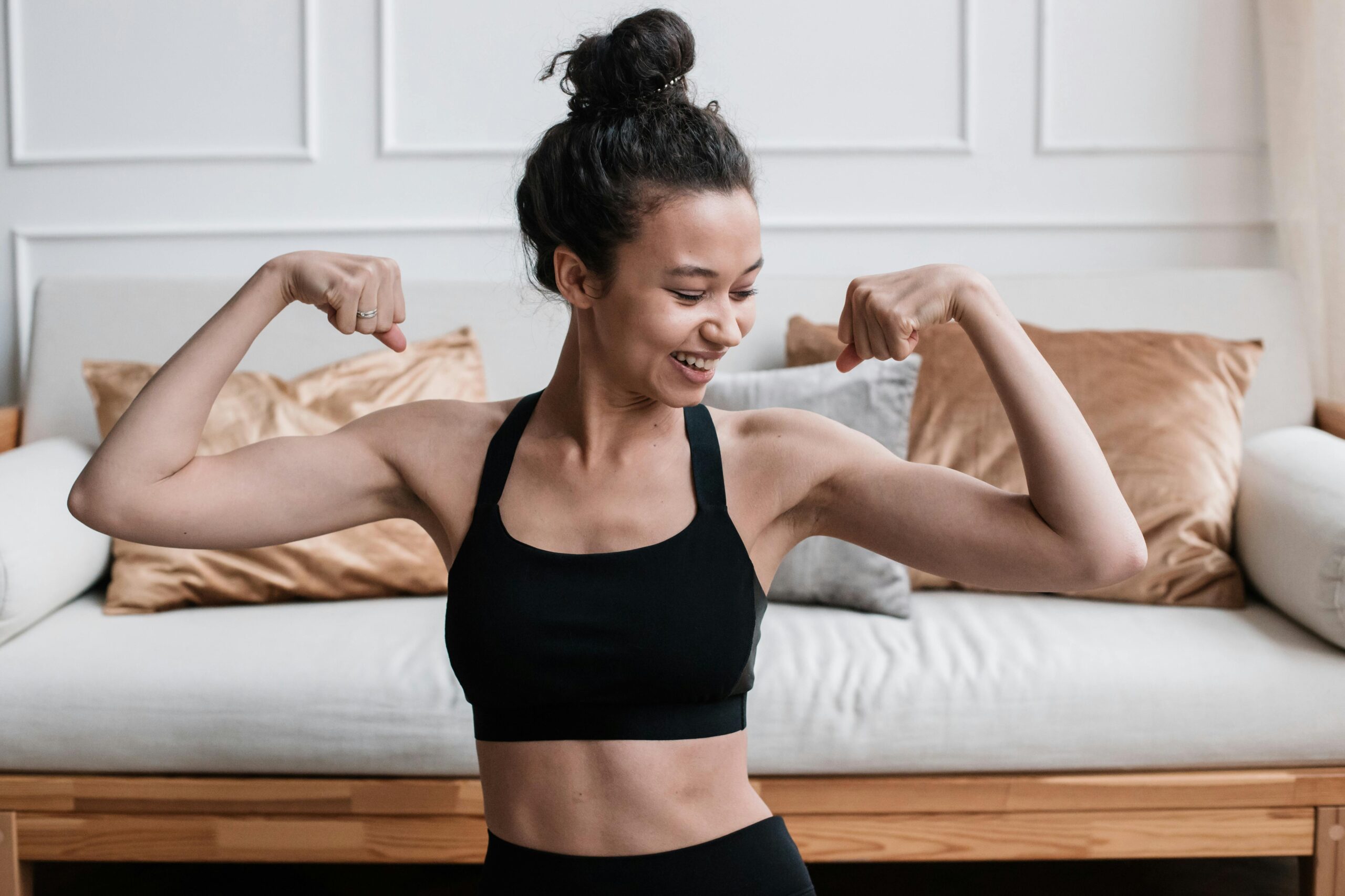 women lifting weights to build strength and bust fitness myths